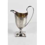 A George III silver helmet form milk jug by Charles Hougham, London 1788, 98g.