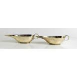 A pair of silver sauce boats, of elegant design, Chester and Birmingham hallmark 1933, 4.21toz.