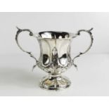 A Georgian silver twin handled trophy, with gadrooned decoration, residual interior gilding,
