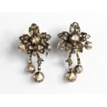 A pair of Georgian early 19th century white metal (unmarked) and diamond stud earrings, each in