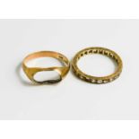 Two 9ct gold rings, one eternity ring set with paste, size U, 2.9g, the other previously set with