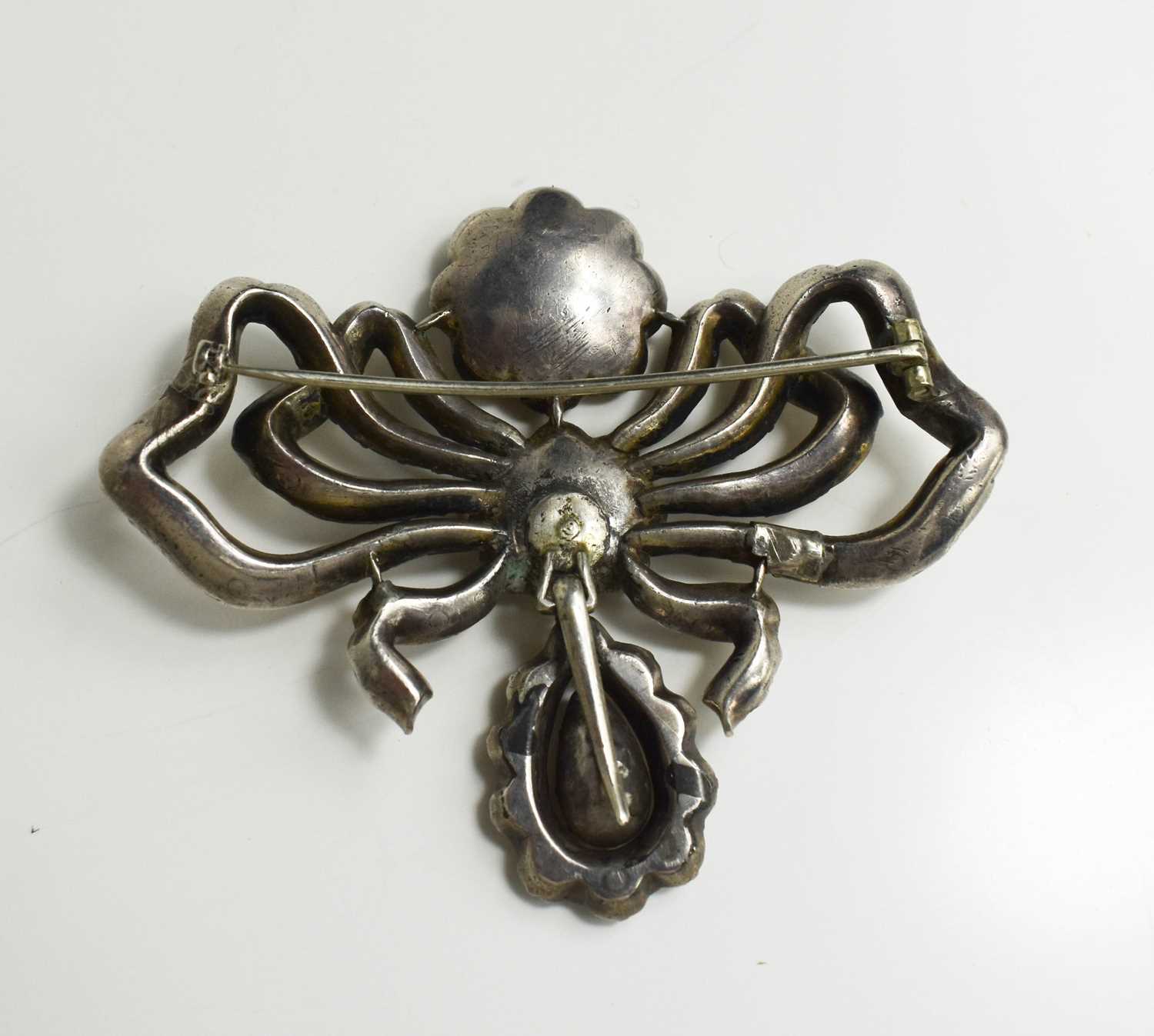 A Georgian silver and yellow gem set metamorphic brooch pendant, in the form of a bow with flower - Image 3 of 5