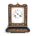 A mid 19th century ebonised mantle clock by Thomas, Paris, the case front having foliate inlaid
