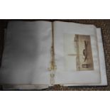 A very large late Victorian scrapbook, filled with prints of various works of art and places, with