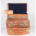 An antique leather suitcase together with a "Doric" leather case, a faux leather 1950s suitcase