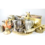 A group of brass and other metal ware to include copper kettle, brass tray, magazine rack, pewter