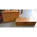 Two antique pine boxes, both with twin iron handles to the sides, the longest measuring 19cm by 83cm