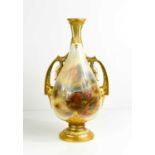 A Royal Worcester twin handled vase by John Stinton, puce mark 1929 of pear shape, painted with