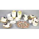 A Coalport part tea service in the 2668 pattern, together with Royal Crown Derby pair of coffee cans