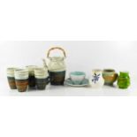 A pottery Japanese influenced tea set, together with two Poole pottery bud vases, and cup and