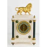 A French alabaster and gilt metal mantle clock, surmounted by a lion, the green/blue Arabic dial