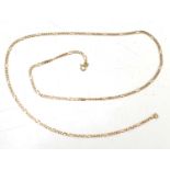 A 9ct rose gold figaro link chain, 6.65g, 56cm long.