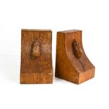 A pair of Robert Thompson 'Mouseman' oak book ends, each carved with signature mouse.