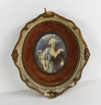 A portrait miniature, printed and overpainted on porcelain, depicting an 18th century gentlewoman