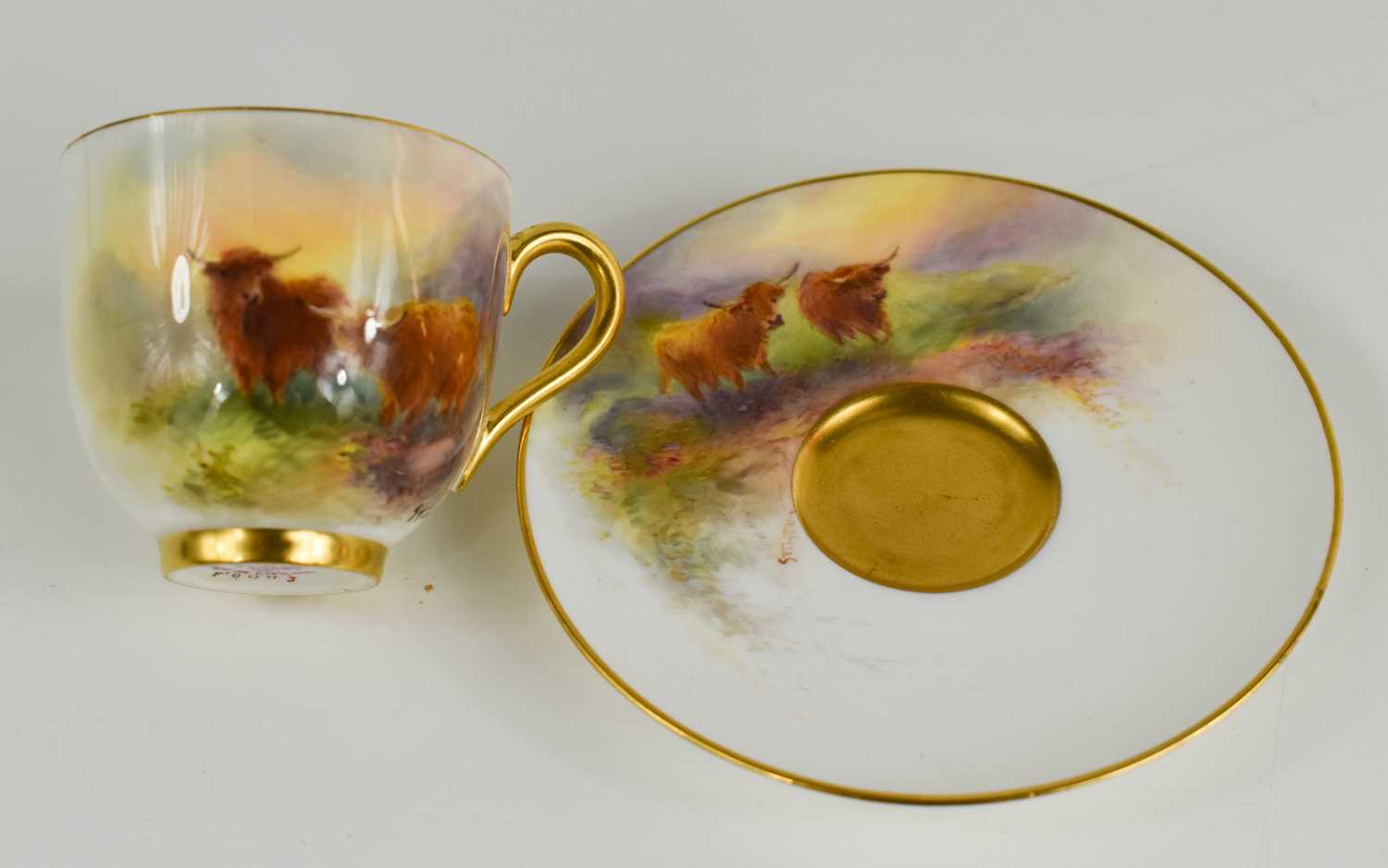 A Royal Worcester cup & saucer, by Harry Stinton, painted with Highland cattle with gilded interior, - Bild 2 aus 3