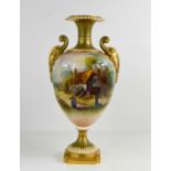 A large Royal Worcester vase painted with figures outside a thatched cottage, with windmill in