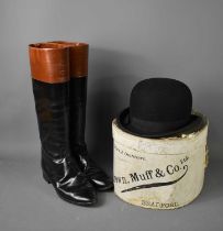 A pair of vintage riding boots, black with tan top, size 5, together with a Brown, Muff & Co of