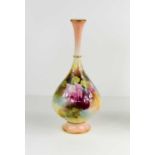 A Royal Worcester bulbous vase with pink and red roses, finely painted with green Worcester mark for
