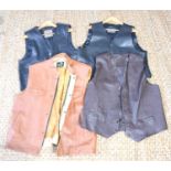 A group of leather biker waistcoats, various brands to include Rixom, Route 69 and others.