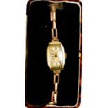 A 1930s rolled gold Medana ladies wristwatch, with a mother of pearl Arabic dial, and chain link