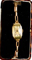 A 1930s rolled gold Medana ladies wristwatch, with a mother of pearl Arabic dial, and chain link