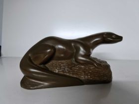 A resin model of an otter.