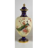 A Royal Worcester vase and cover, painted with an Indian peacock perched on a branch, circa 1980,