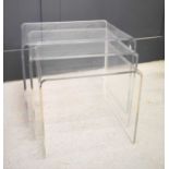 A nest of three modern contemporary designer perspex tables.