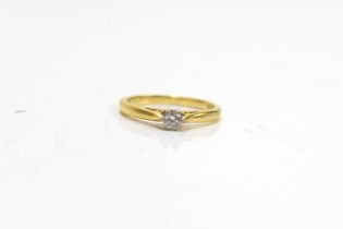 An 18ct gold and diamond solitaire ring, size k, 2.49g.
