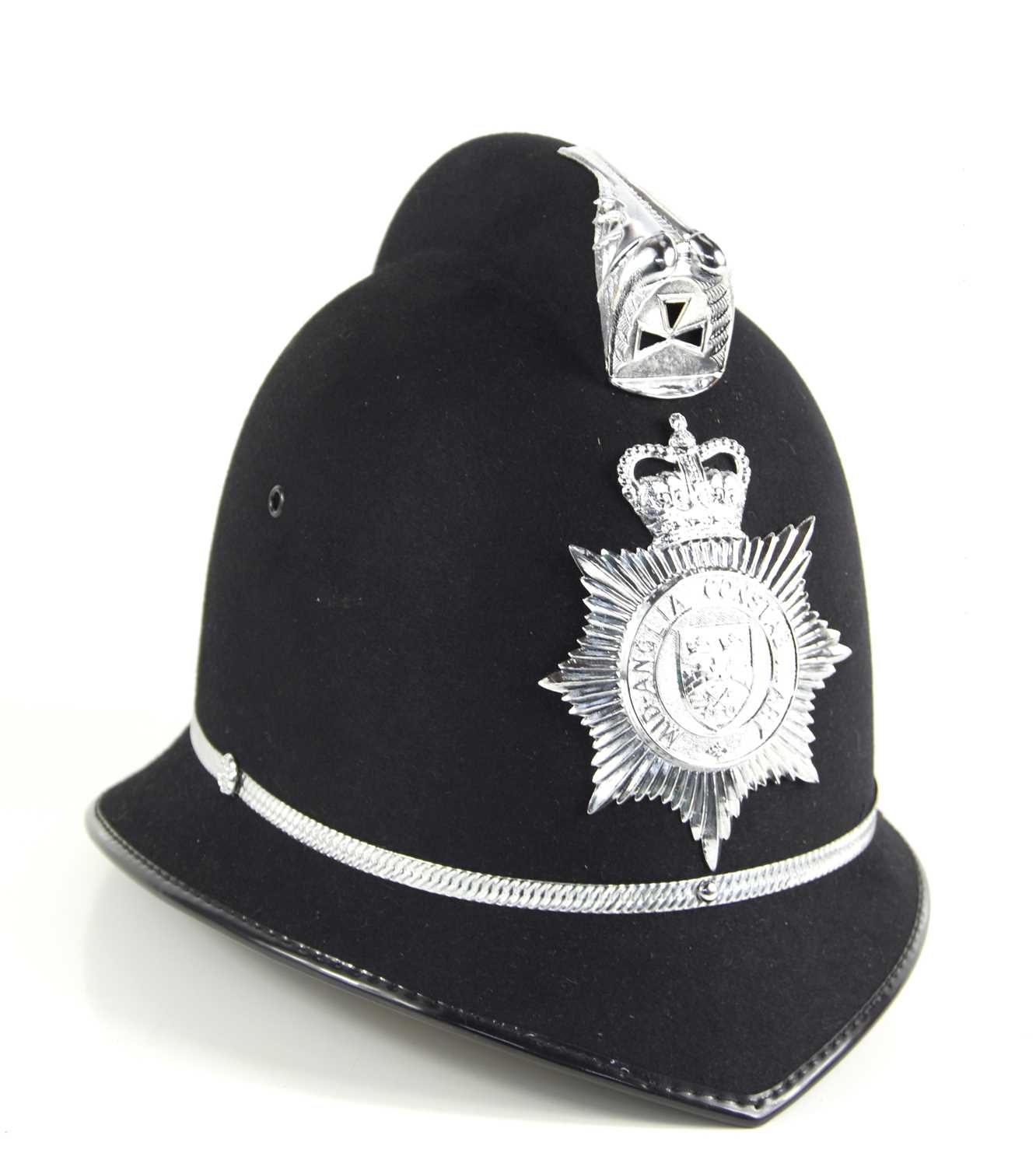 A vintage Mid-Anglia Constabulary police helmet, made by Christy's of London.