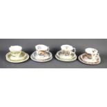 A set of four Royal Doulton "Brambly Hedge" four seasons, plates, cups and saucers.