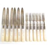 A set of silver fish knives and forks with mother of pearl handles, hallmarked for Sheffield 1905.