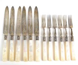 A set of silver fish knives and forks with mother of pearl handles, hallmarked for Sheffield 1905.