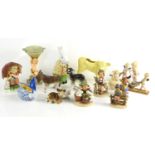 A group of animal ornaments and figurines to include four Goebel Hummel examples.