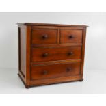A 19th century mahogany apprentice pieec chest of drawers with two short over two long drawers, 30