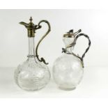 Two 19th century glass Claret jugs, with etched decoration, one by Elkington, 29cm and 25cm high.The