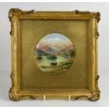 A porcelain plaque by G Micklewright, painted with a view of Rydal Water, signed, 12cm diameter, the