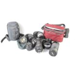 A Nikon D3200 SLR digital camera with various lenses to include Sigma 28-300mm, Nikon 18-70mm, Nikon