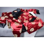 A gentleman's Chinese silk jacket in red and black, with tie, in original box.