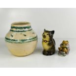 A Tony Wood cream jug in the form of a cat, with mouth as spout, a Beswick Mr Fisher, and a Studio