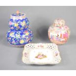 Two Chinese ginger jars, one in the Famille Rose style decorated with flowers, together with a