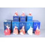 A group of Royal Doulton figurines to include Autumn Breezes HN1934, Buttercup HN 2399, Fair Lady