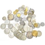 A group of coins, including a large number of pre 1947 half crowns, 1921 silver dollar and a