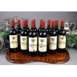 Twelve bottles of Chateau Haut Ferrand, Pomerol red wine, 1995, 750ml.Labels are worn on seven