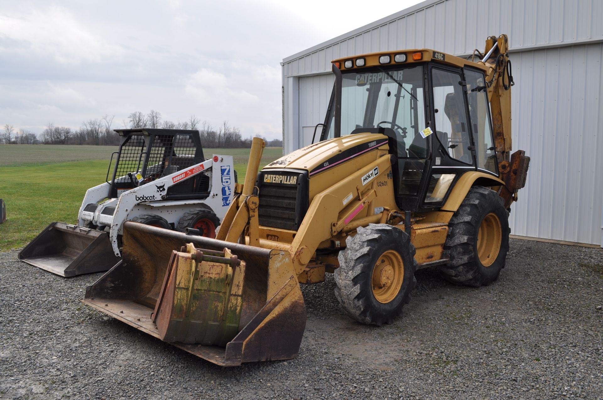 CAT 416C backhoe, 88” bucket, 19.5-24 rear, 12.5/80-18 front, 4x4, 18” and 24” digging buckets