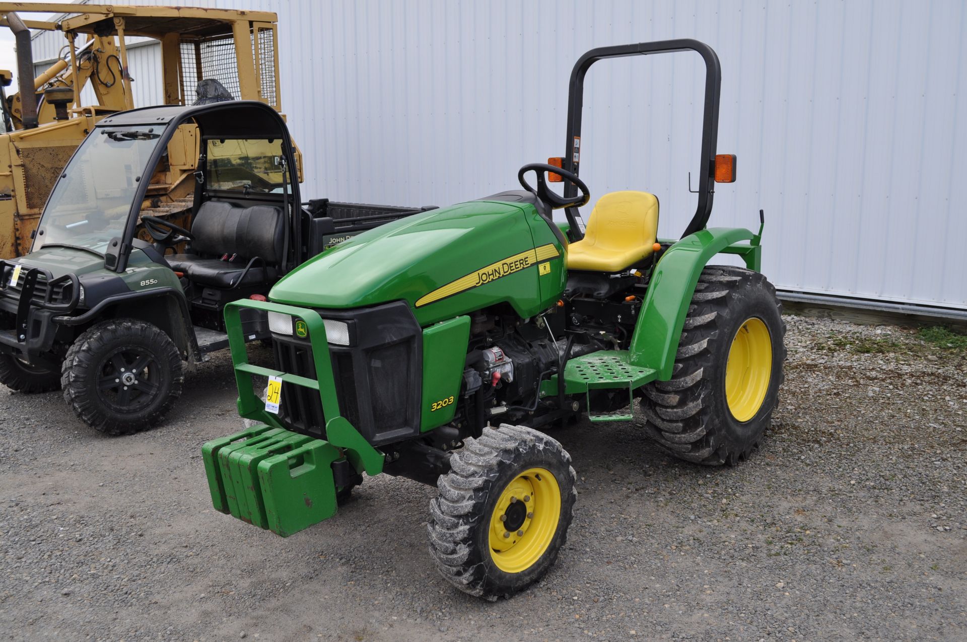 John Deere 3203 compact tractor, 15-19.5 rear, 25 x 8.50-14 front, 4x4 front wts, mid mast hyd