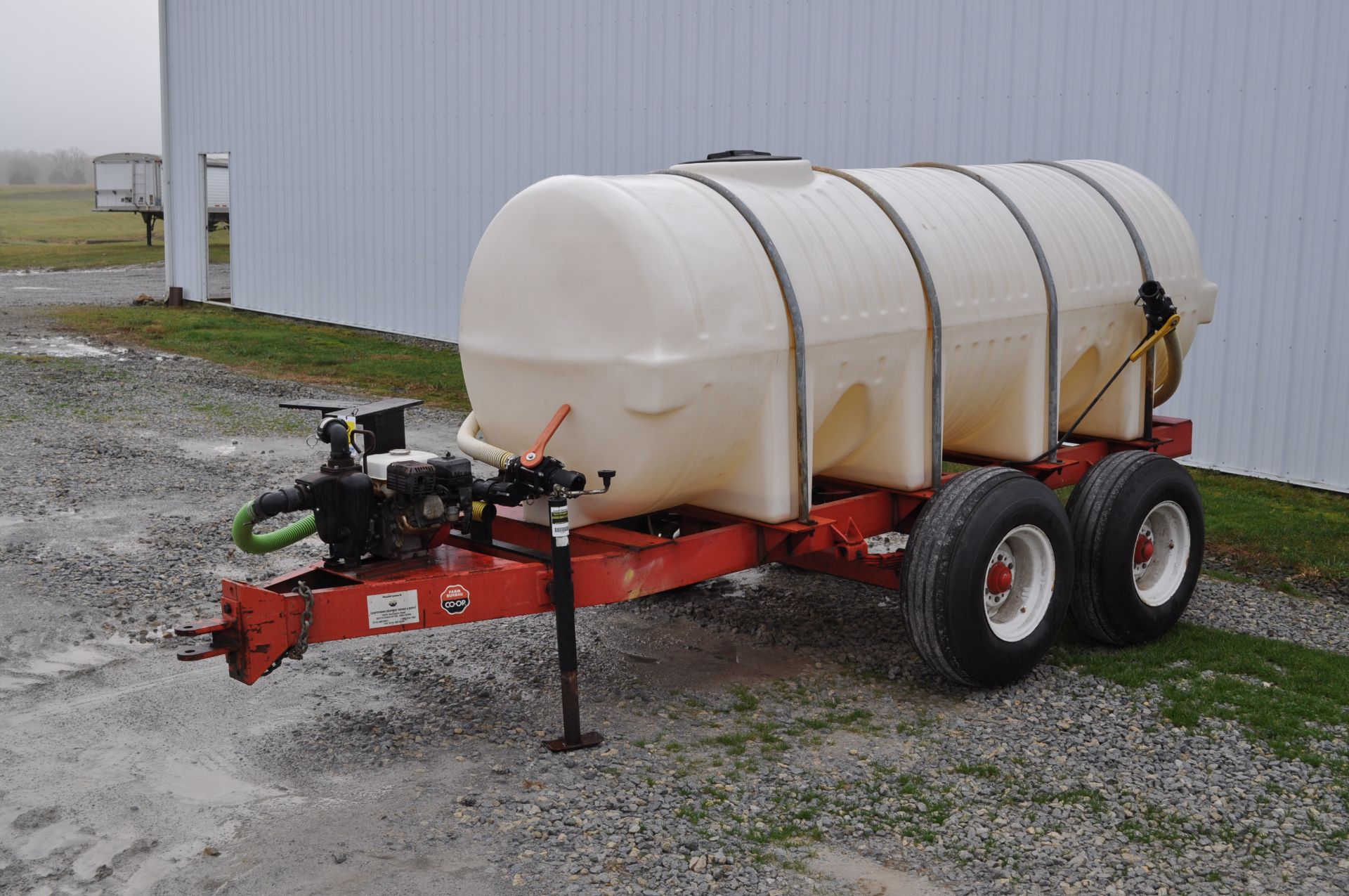 1000 gal nurse trailer, tandem axle, 2” plumbing, Honda motor, cast iron pump, 11 L 15 tires