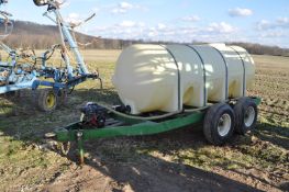 1000 gal poly tank on tandem axle trailer, 11L-15 tires, Pacer 2” poly pump, Briggs and Stratton gas