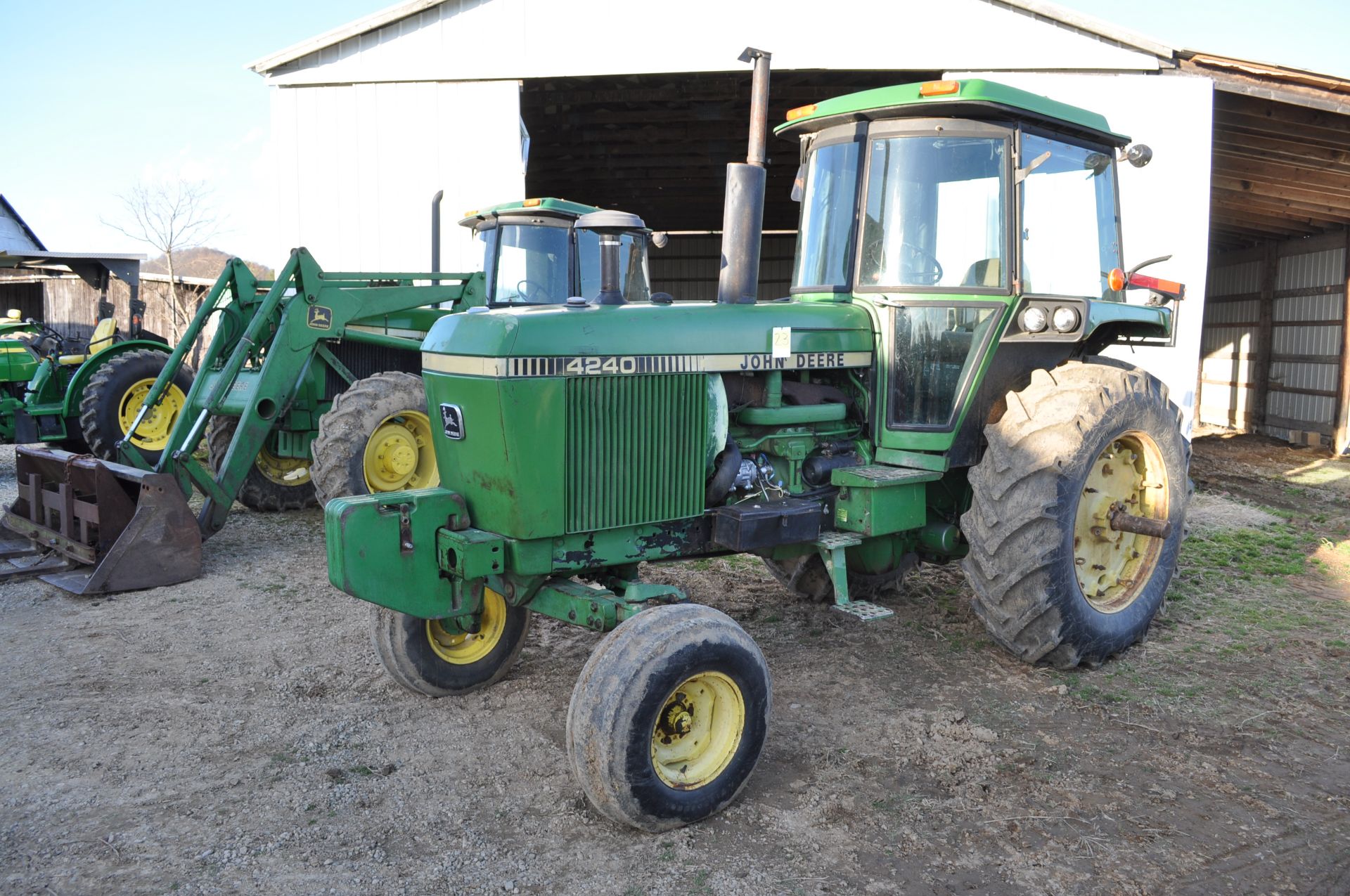 John Deere 4240 tractor, Cab, 18.4-34 tires, 11L-15 front, front weights, quad range, 2 hyd remotes