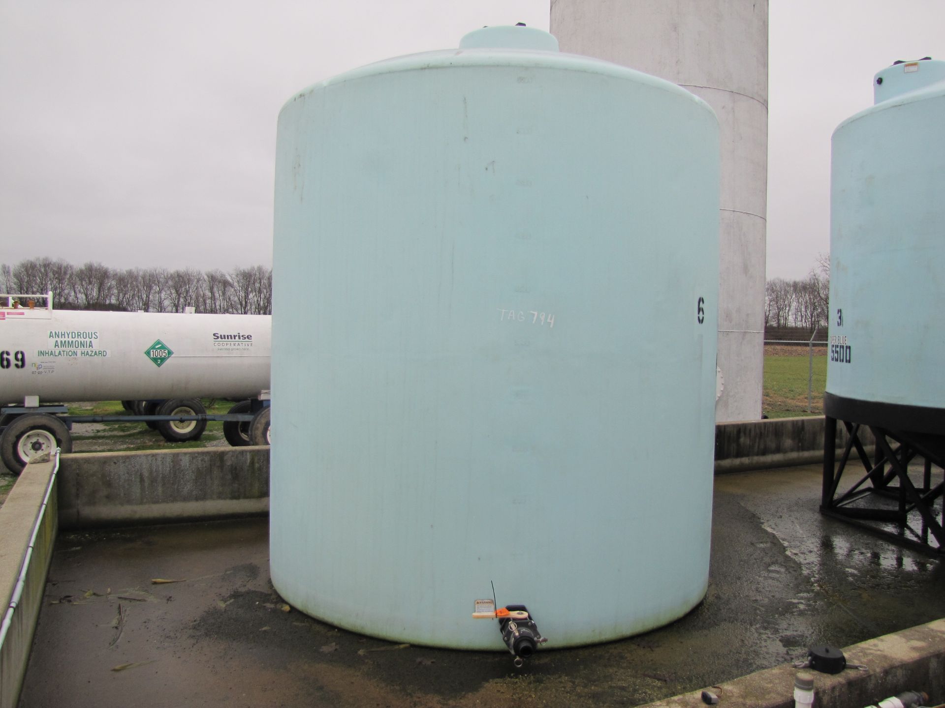 Tag 794: 6,000-gal upright poly tank, 3” plumbing